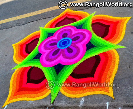 Multi coloured rainbow flower rangoli design 2019