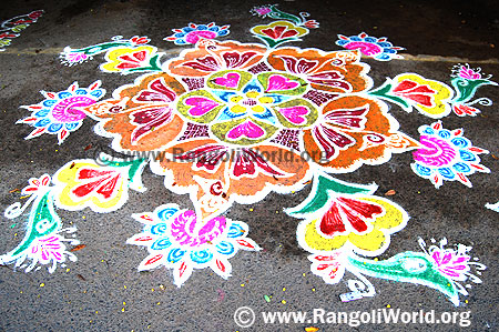 Freehand Rangoli with blooming flowers