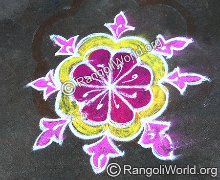 Simple Freehand Rangoli with yellow and pink  Flowers