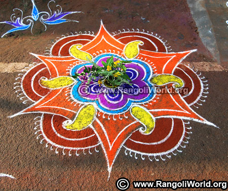 Star flower rangoli with avarampoo neem leaves
