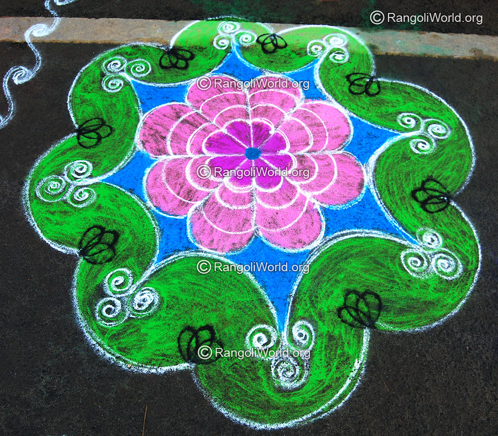 Flower Rangoli Jan 2008 with eyes, nose and  mouth creation